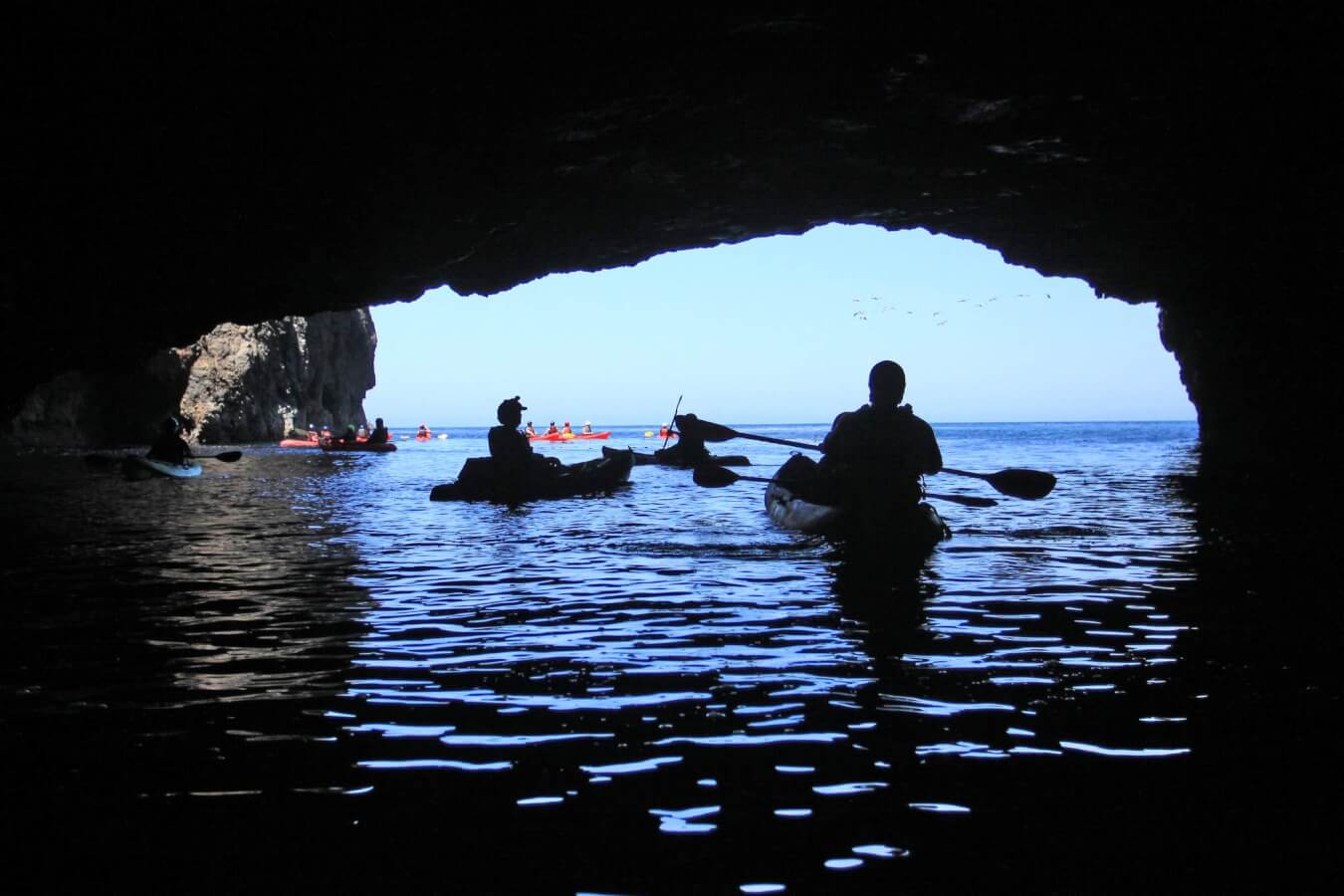 Paddle Painted Caves at Channel Islands National Park kayakers at the painted caves off the islands
