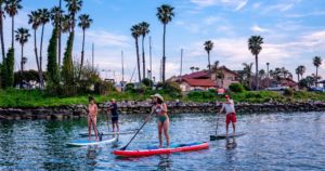 Adventure Awaits in Ventura standup paddleboard ventura harbor village the outbound collective josiah roe