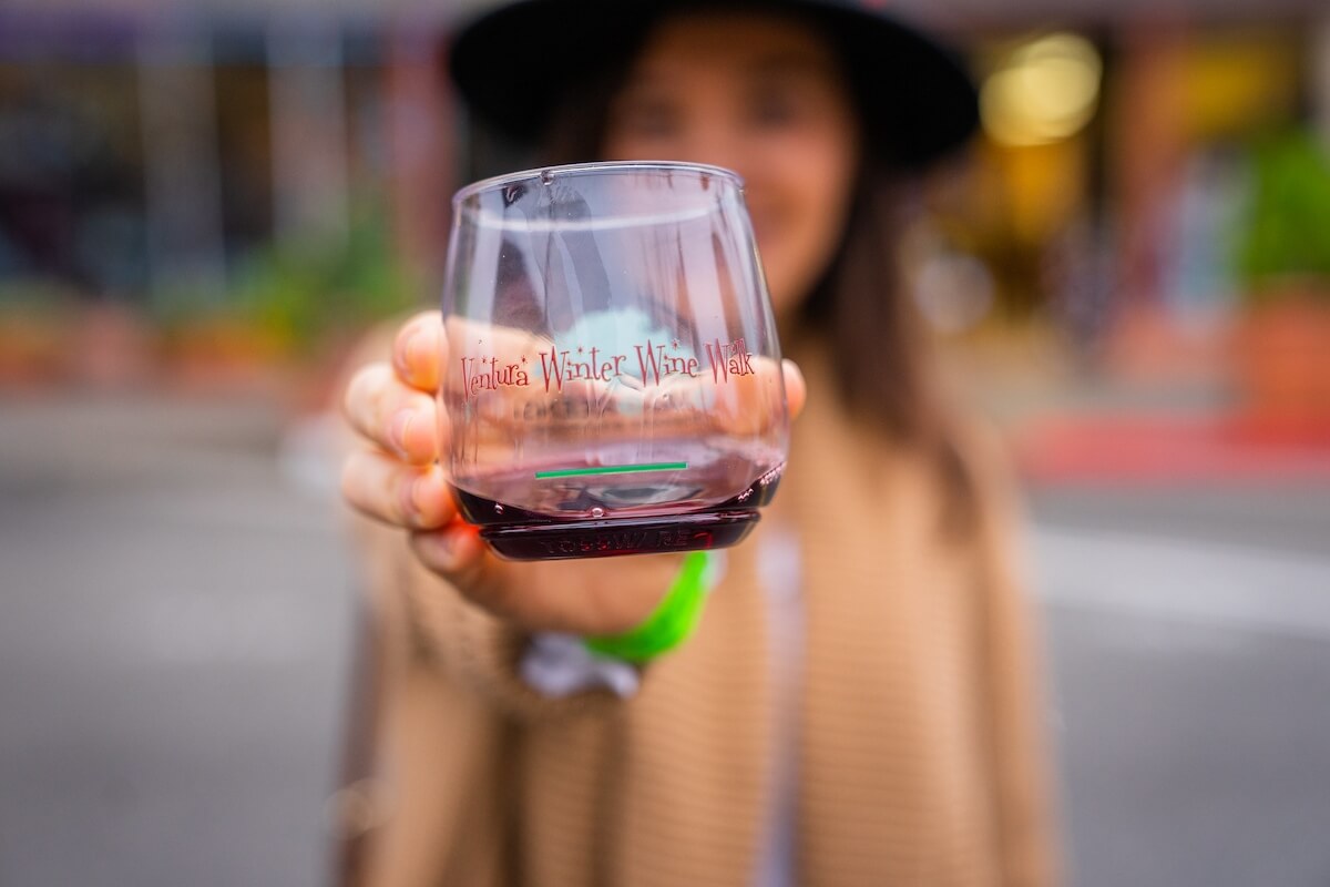Top Events in Ventura  girl holding glass at wine walk