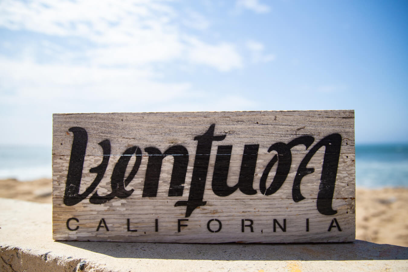The Ventura Visitors Center has Your Summer Vibes Ventura wood sign for visitor center blog