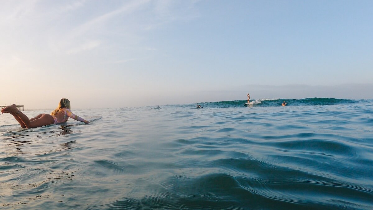 A Guide to Surfing in Ventura surfer girls at the cove