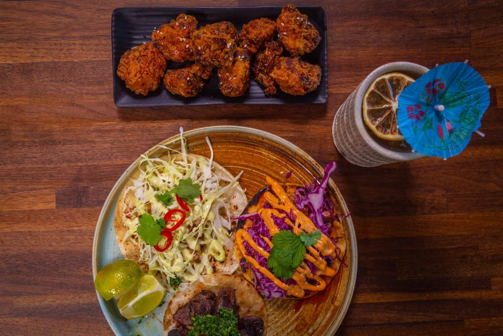 10 Cozy Restaurants with Cocktails and Comfort Food You Have to Try in Ventura rocks and drams in ventura food and cocktail