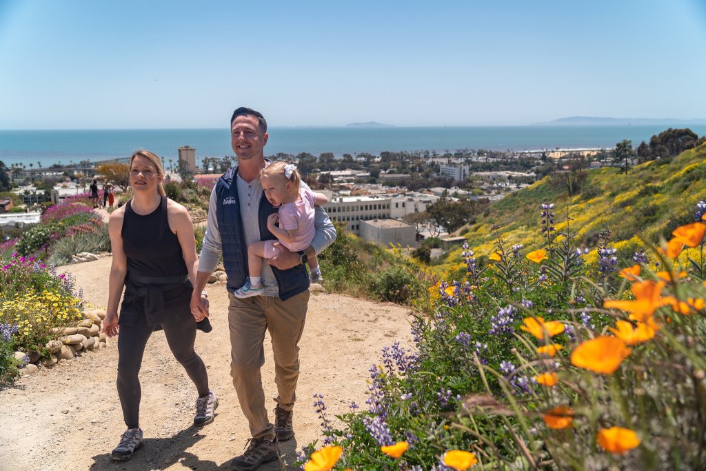Best Things to Do Near the Ventura Pier A family at Ventura Botanical Gardens during the spring, a great picturesque spot in Ventura