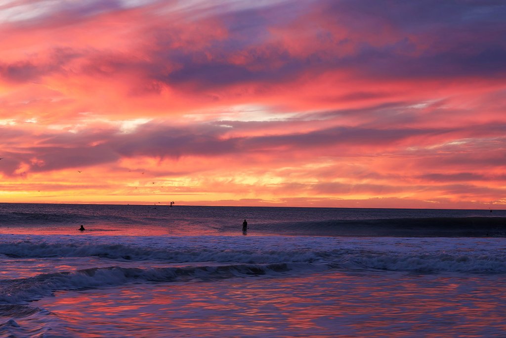 Finding Creative Inspiration in Ventura, California pink, blue, and yellow sunset at the harbor