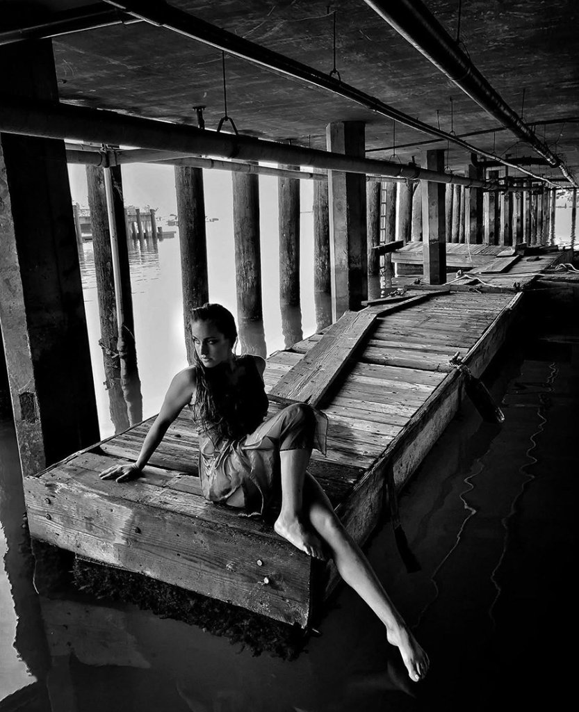 Finding Creative Inspiration in Ventura, California black and white photo of woman at the harbor